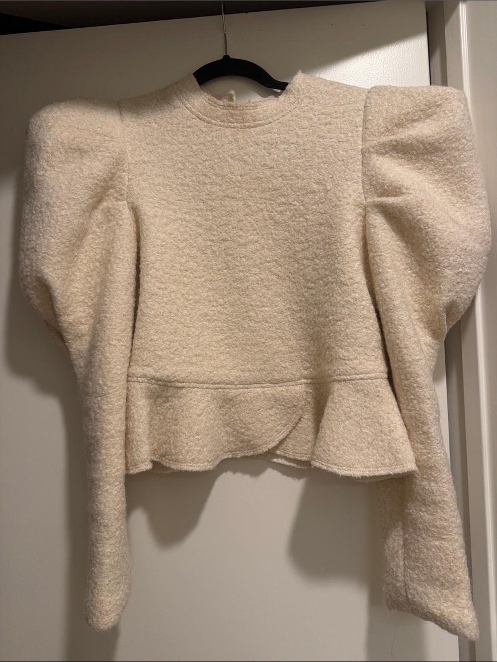 Textured Puff-Sleeve Peplum Sweater in Cream